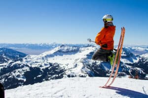 Ski lift chairlift ascending a snow-covered mountain slope at a ski resort