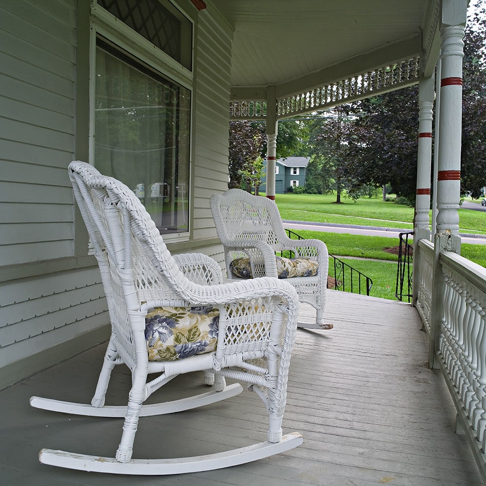 Charming vacation rental home with porch and garden ready for guests